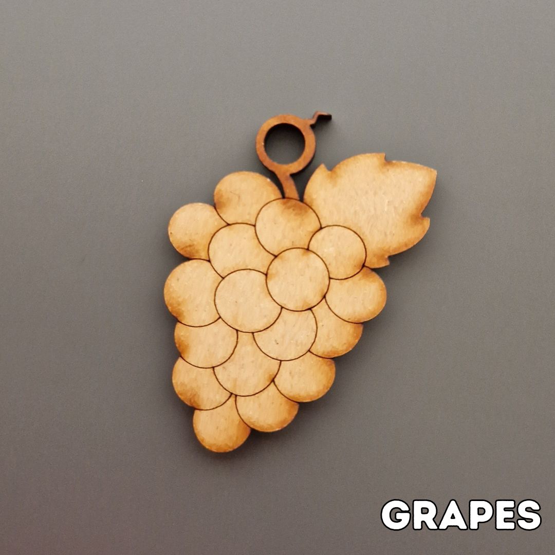 wooden grapes shape displayed on grey background