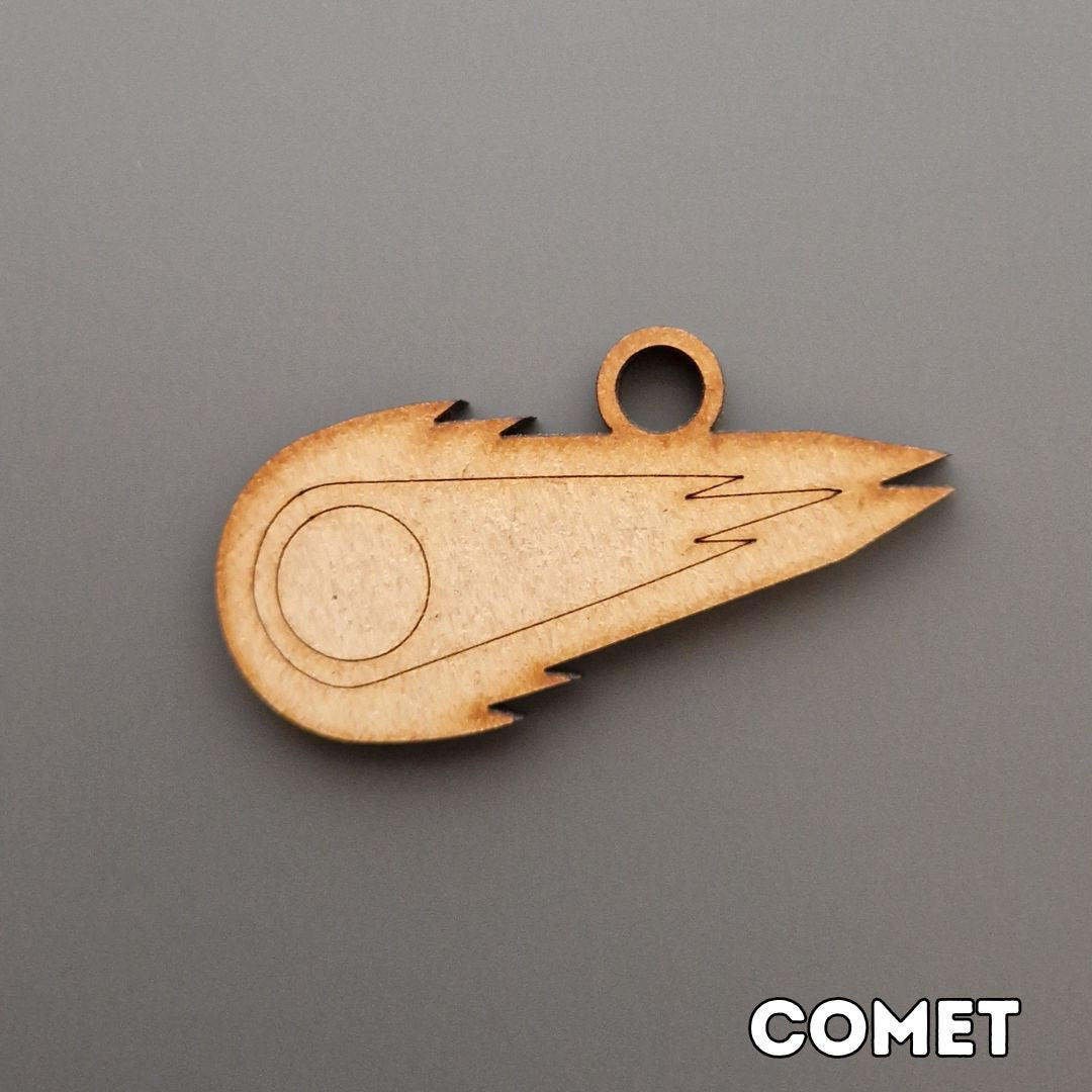 wooden comet shape displayed on grey background