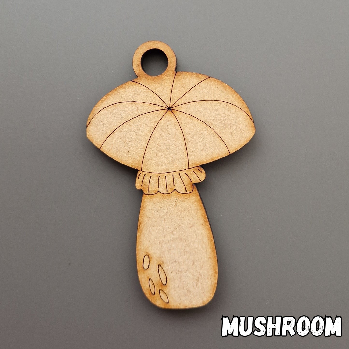 wooden mushroom shape displayed on grey background