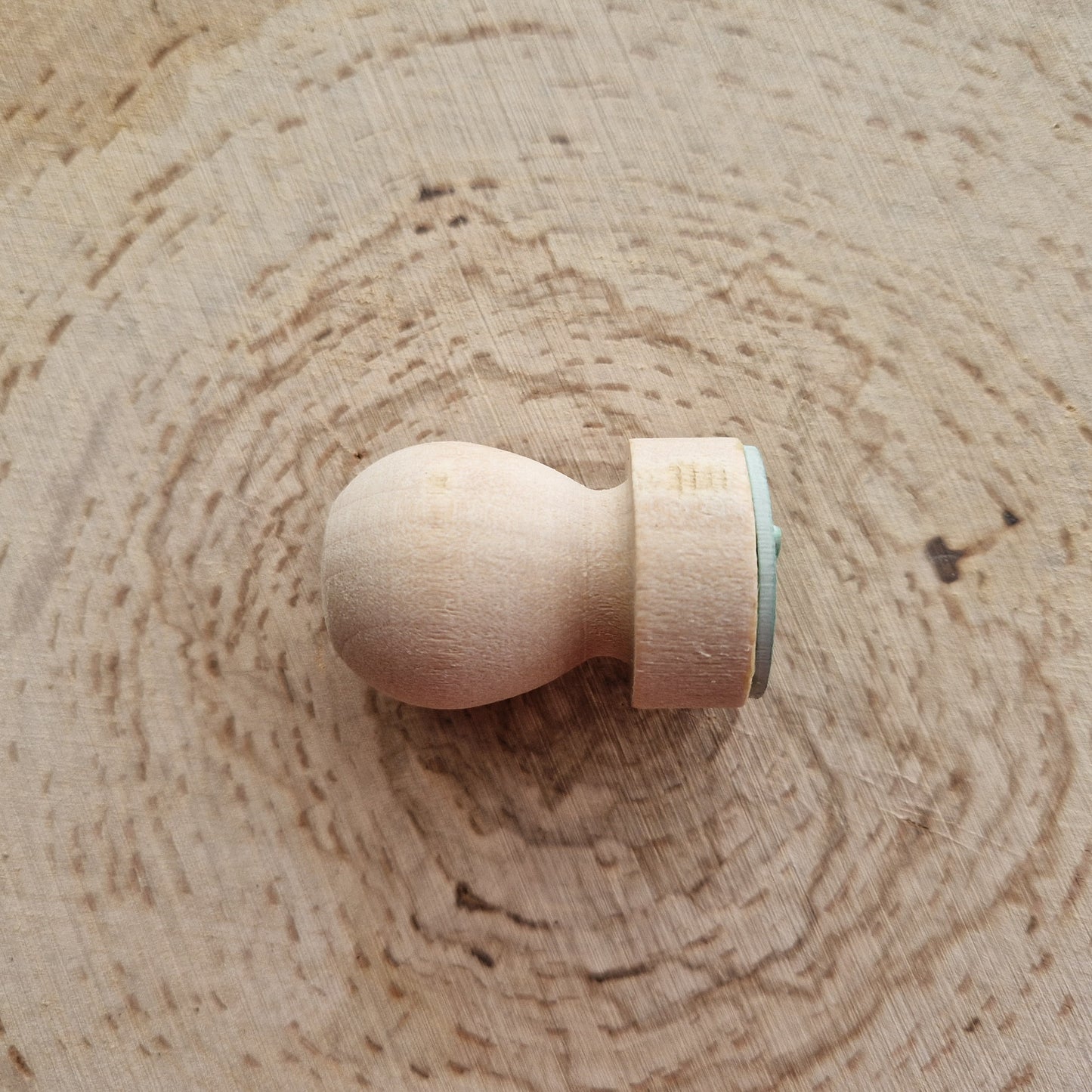 Eco Rubber bee stamp displayed on wooden background