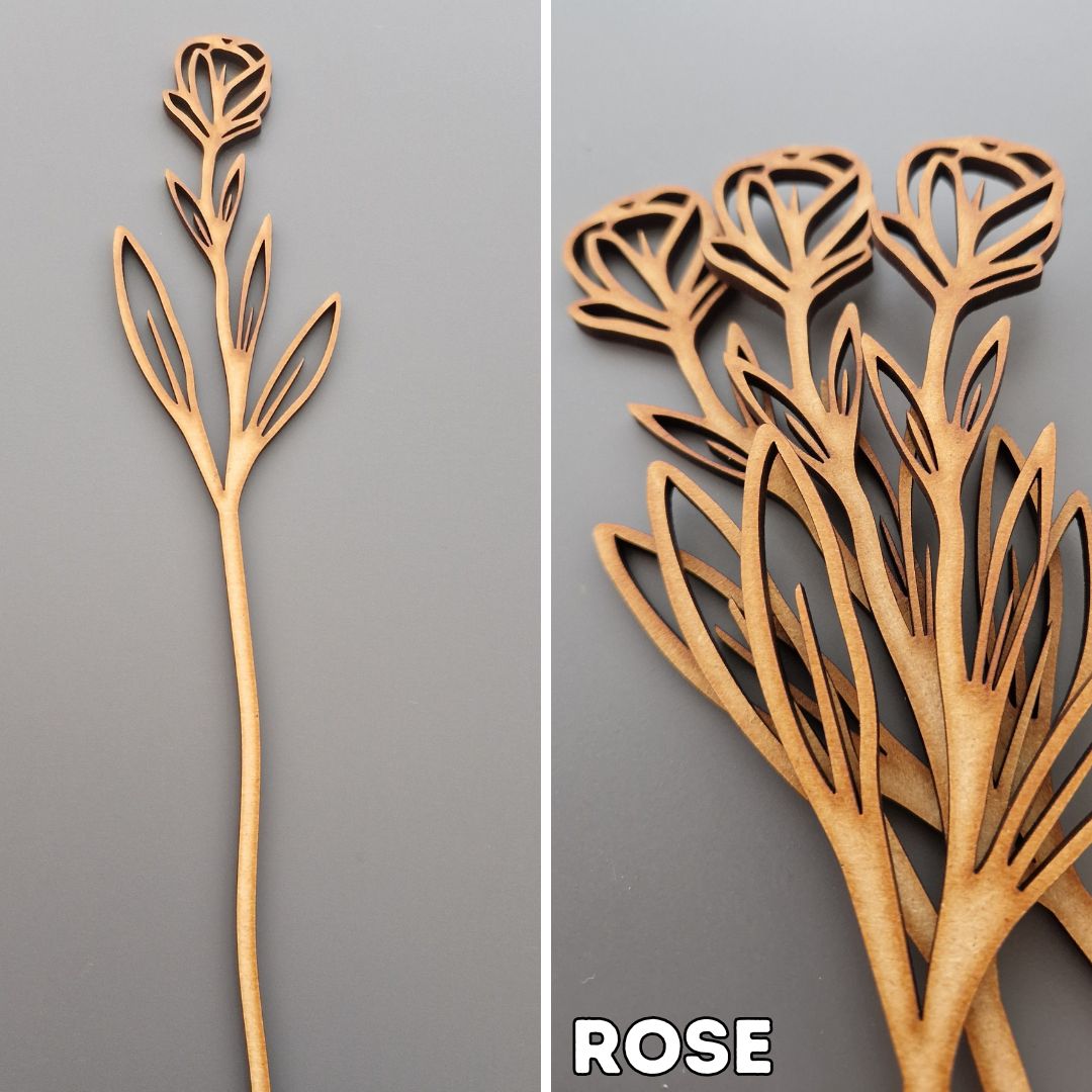 wooden rose displayed on grey background