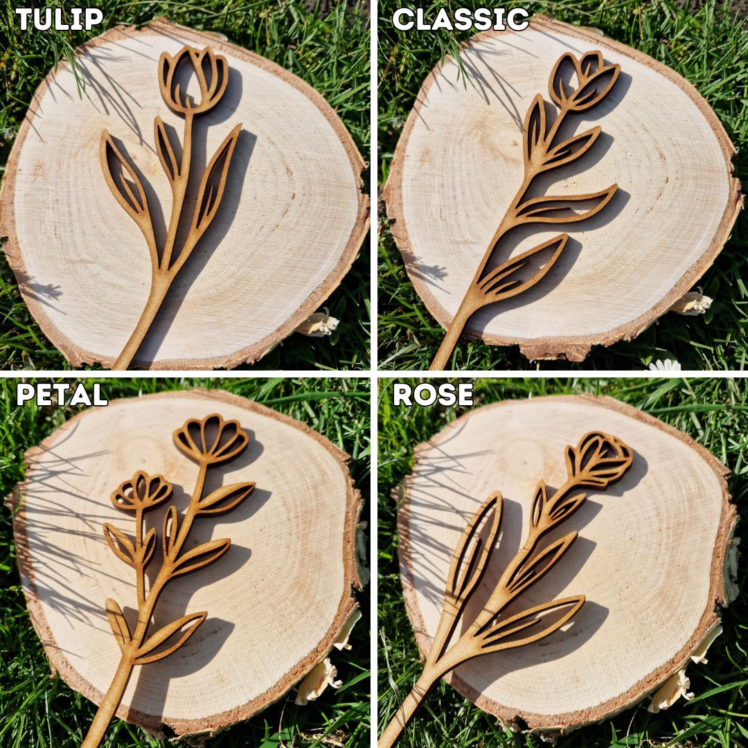 wooden flowers displayed on log slice