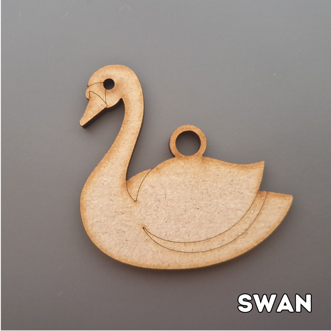 wooden swan shape displayed on grey background