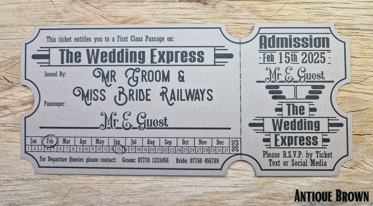 Vintage train ticket wedding invites displayed on a wooden background