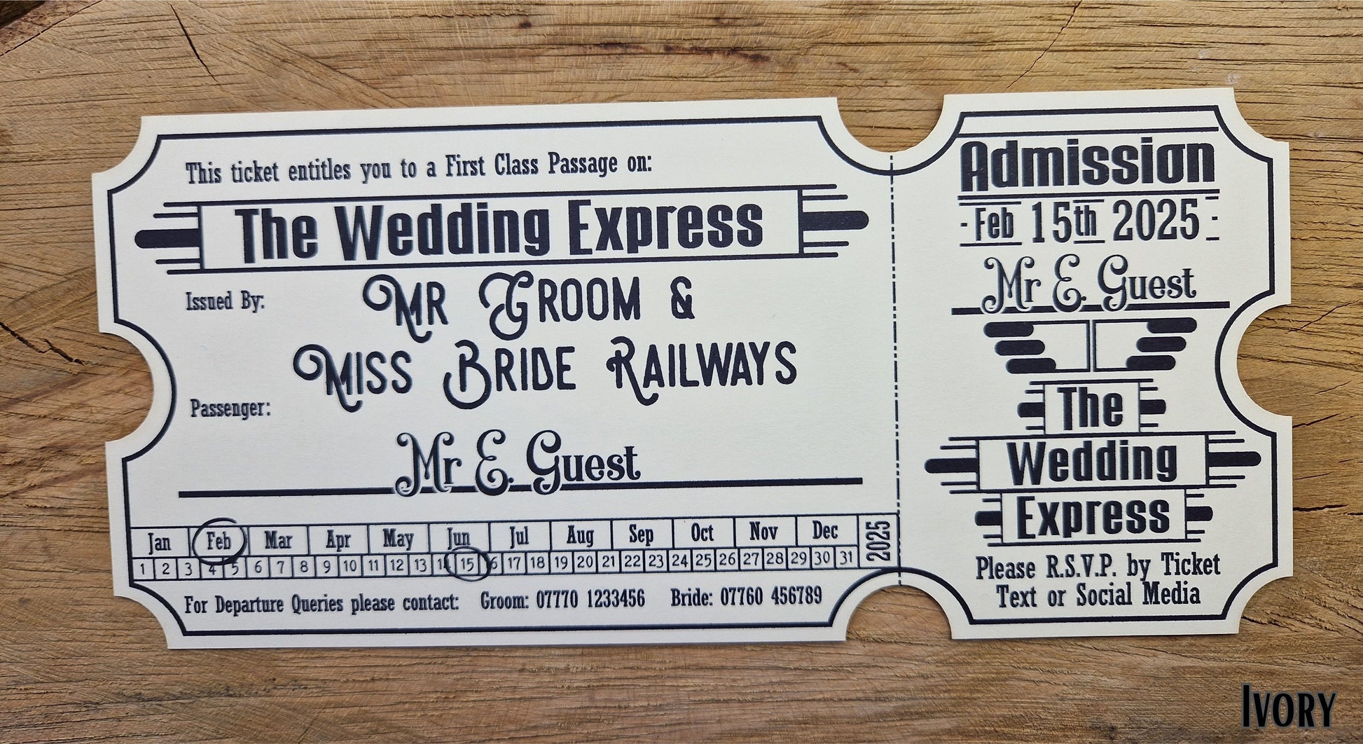 Vintage train ticket wedding invites displayed on a wooden background
