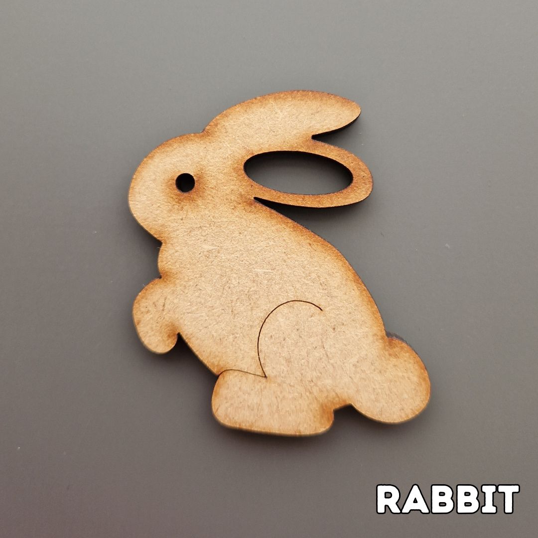 wooden rabbit shape displayed on grey background