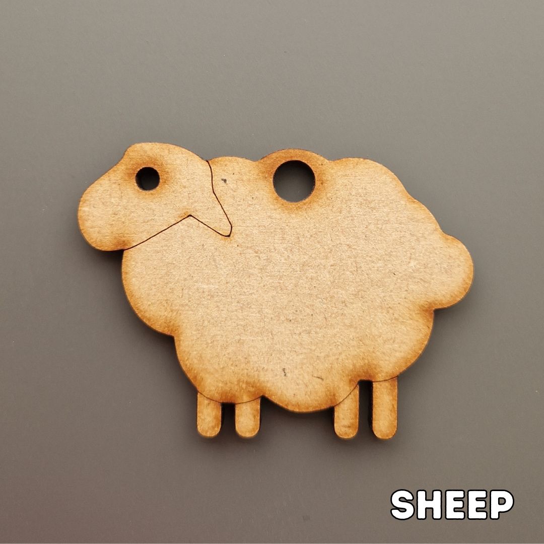 wooden sheep shape displayed on grey background