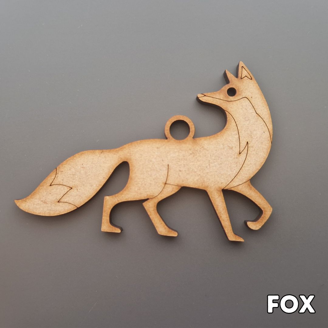 wooden fox shape displayed on grey background